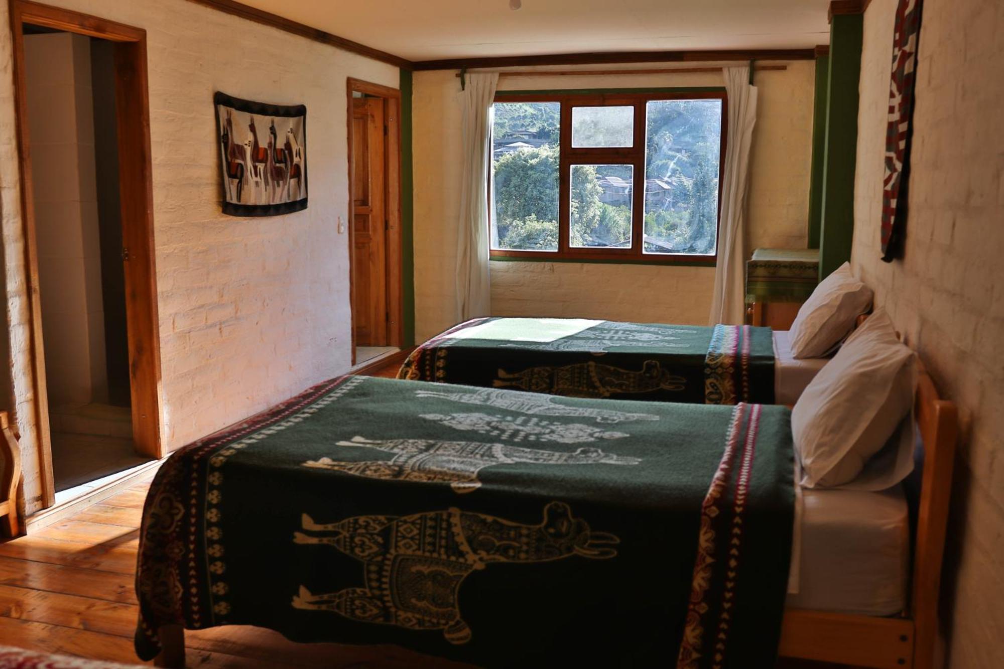 La Casa Verde Eco Guest House บาญอส ห้อง รูปภาพ