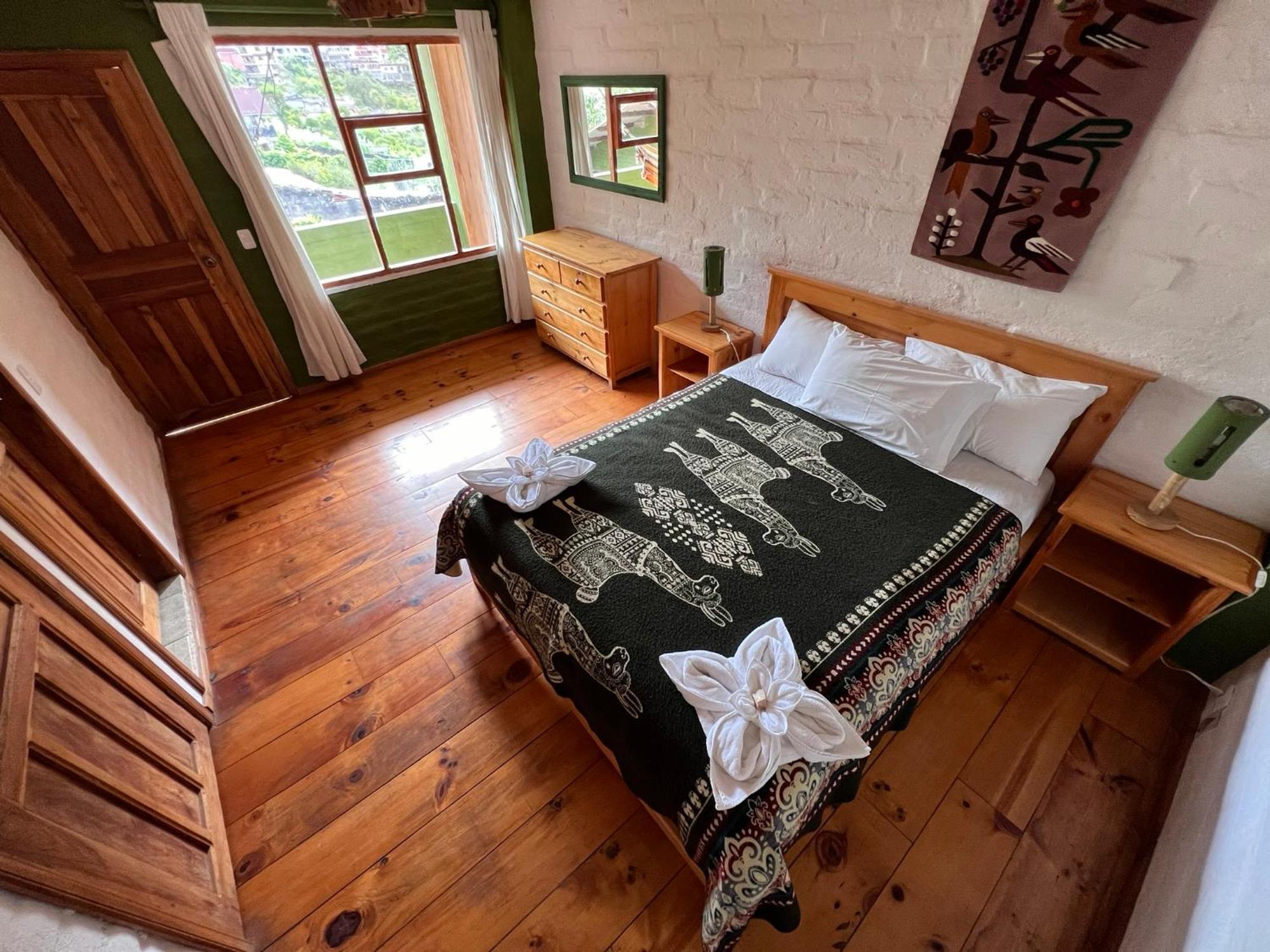 La Casa Verde Eco Guest House บาญอส ห้อง รูปภาพ
