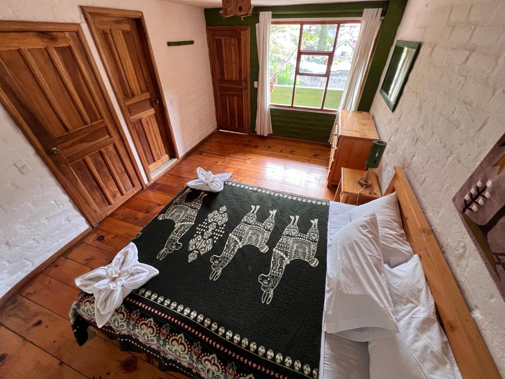 La Casa Verde Eco Guest House บาญอส ห้อง รูปภาพ