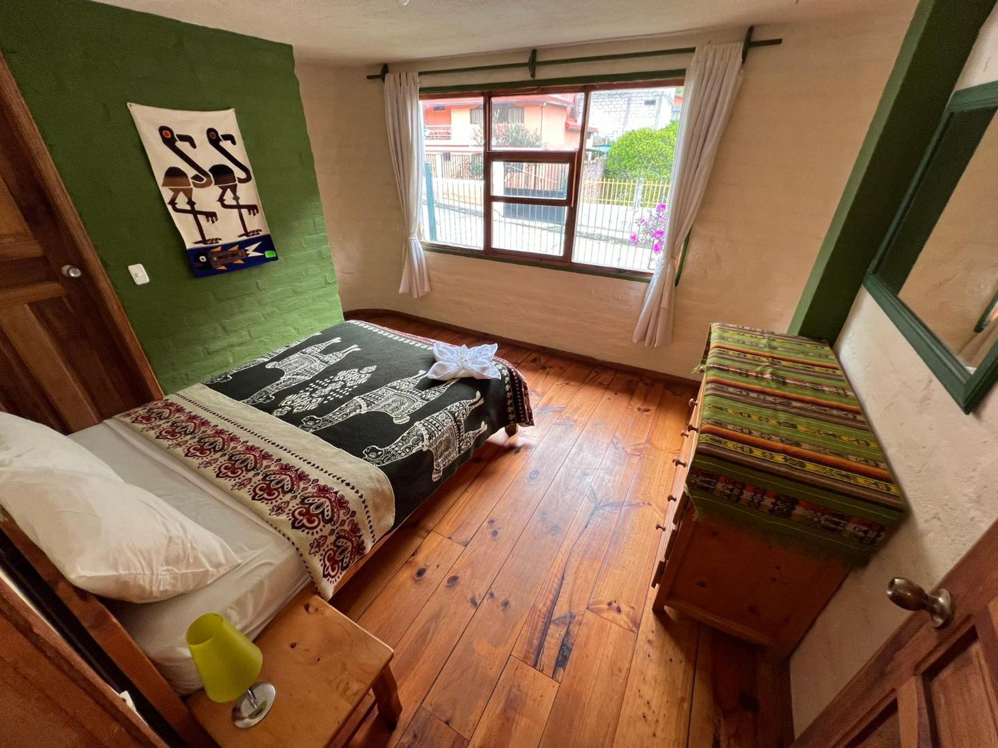 La Casa Verde Eco Guest House บาญอส ห้อง รูปภาพ