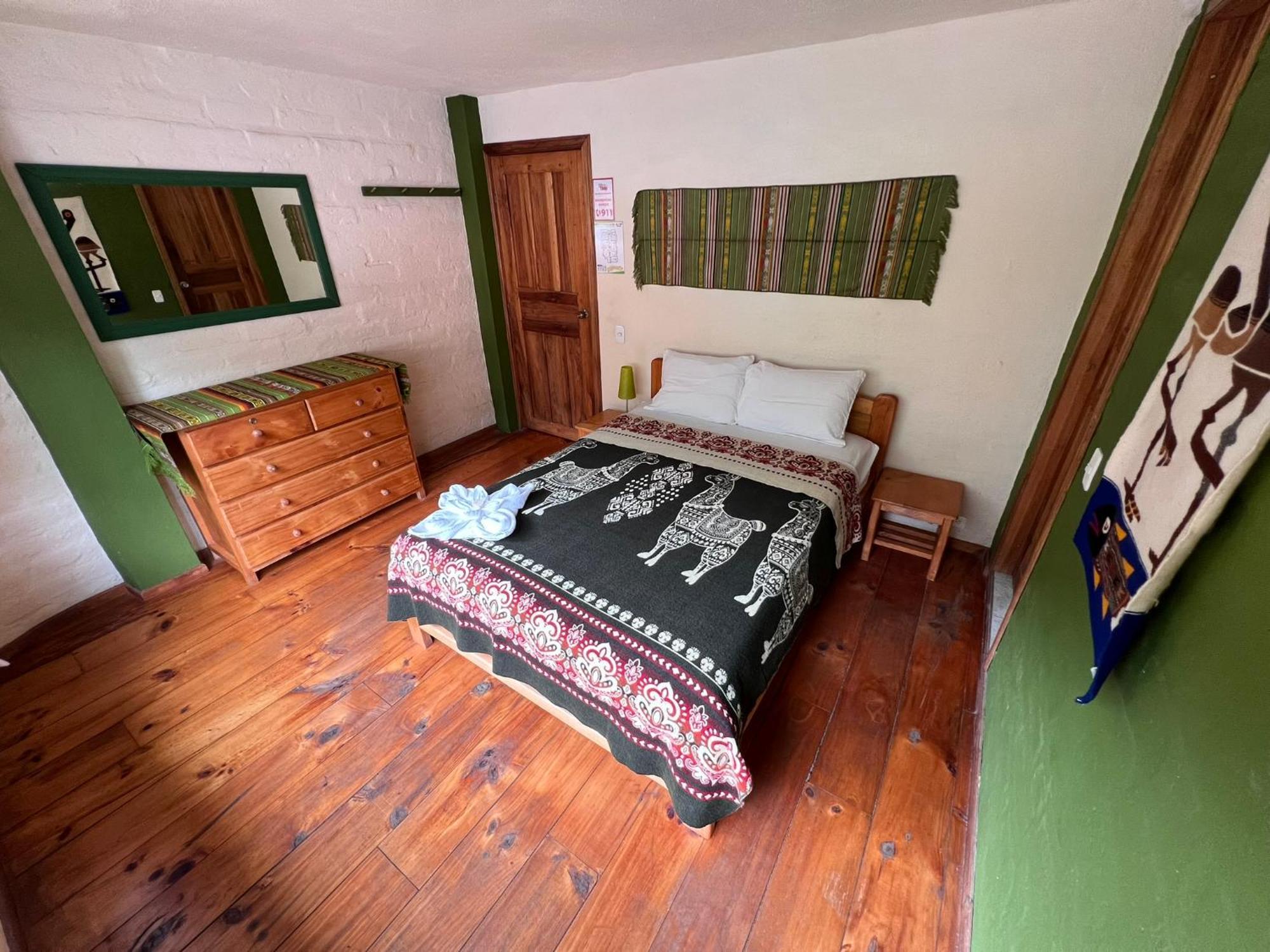 La Casa Verde Eco Guest House บาญอส ห้อง รูปภาพ