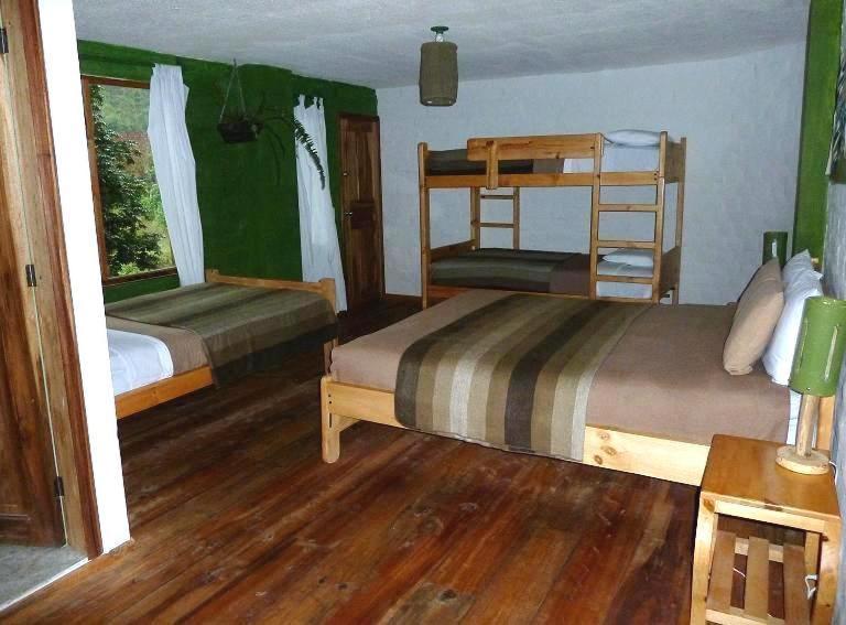 La Casa Verde Eco Guest House บาญอส ห้อง รูปภาพ